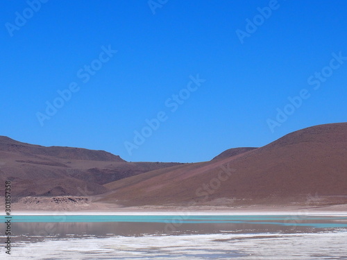 Laguna Verde, Beautiful lake and nature view from the car, Journey from San Pedro de Atacama in Chile to Uyuni in Bolivia