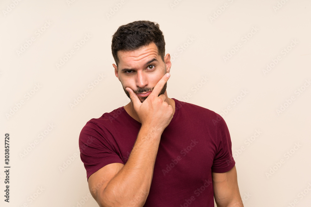 Handsome man over isolated background thinking an idea Handsome man over isolated background thinking an idea