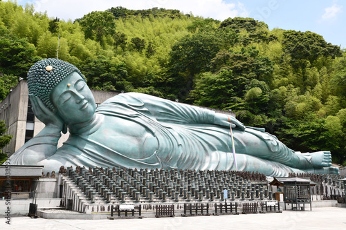 Bronze statue of a reclining Buddha