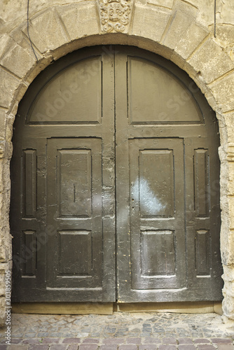 Old vintage wooden facade decorative brown door