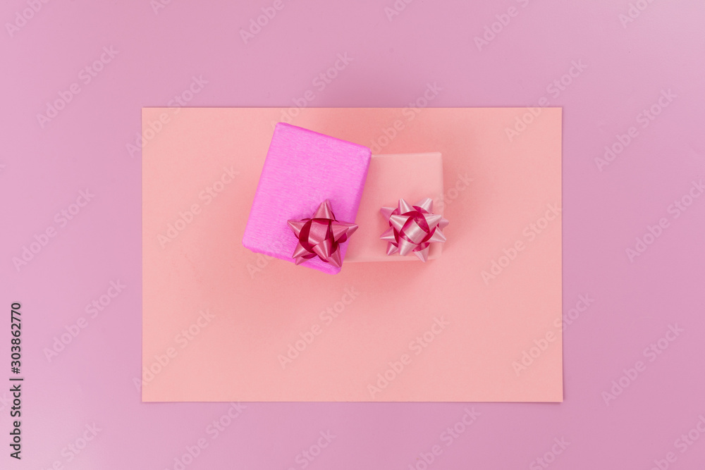Small gifts wrapped in pink and red paper