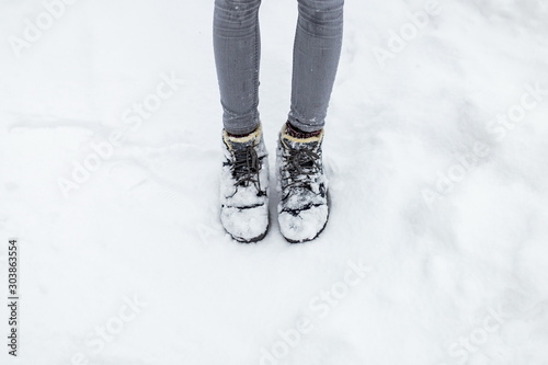 winter shoes or boots stained with snow