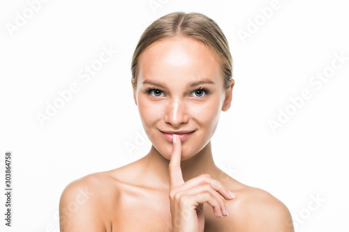 Young attractive woman face over isolated white background