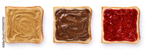 Photos Toasts with chocolate butter, peanut butter and  berry jam isolated on white background