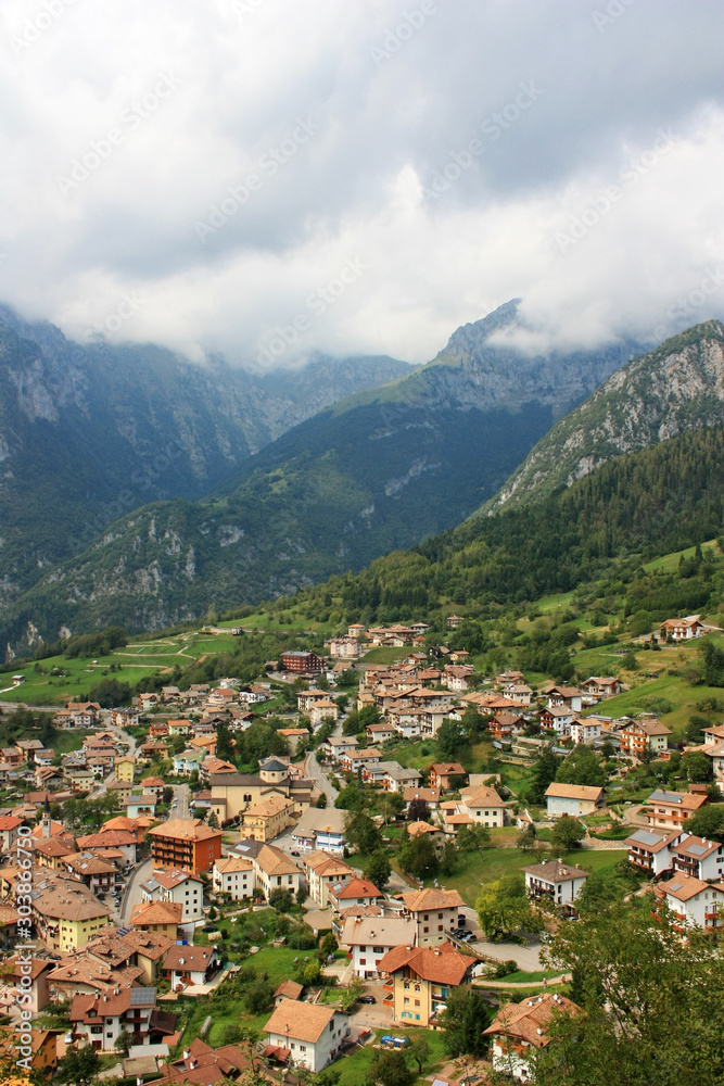 Italian village on the slope of the Dolomites