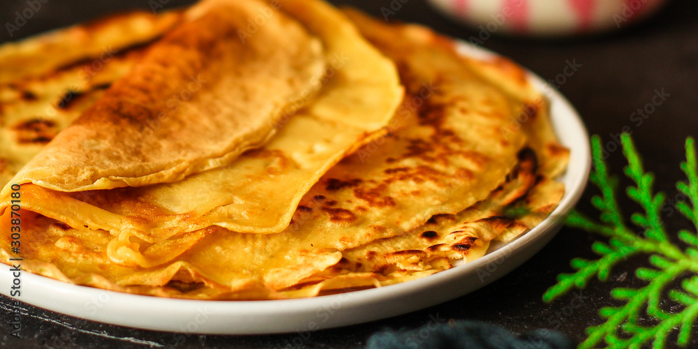 pancakes fritter crepe (delicious dessert or breakfast snack) menu concept. food background. top view. copy space pancakes fritter crepe (delicious dessert or breakfast snack) menu concept. food background. top view. copy space