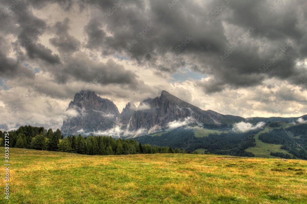 Ortisei Val Gardena, view of the Alpe Siusi with the massif of the Sasso Lungo. HDR photo