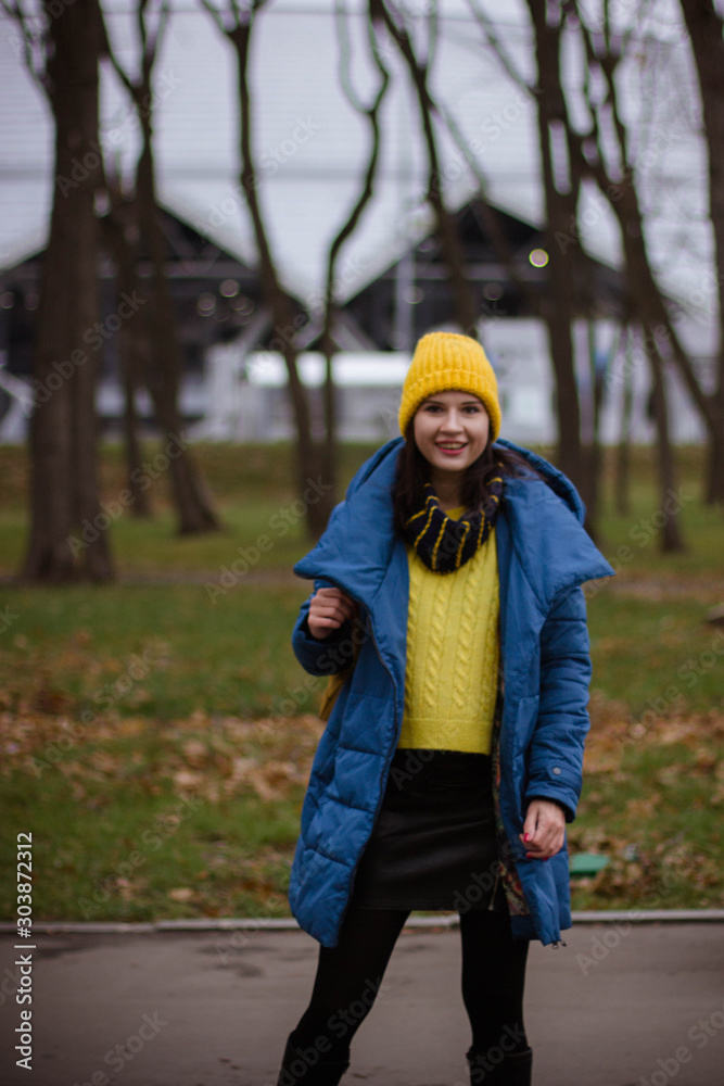 portrait of young woman in autumn park portrait of young woman in autumn park