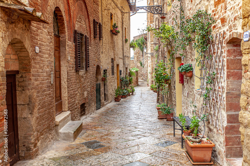 Fototapeta Naklejka Na Ścianę i Meble -  Volterra medieval town Picturesque  houses Alley in Tuscany Italy