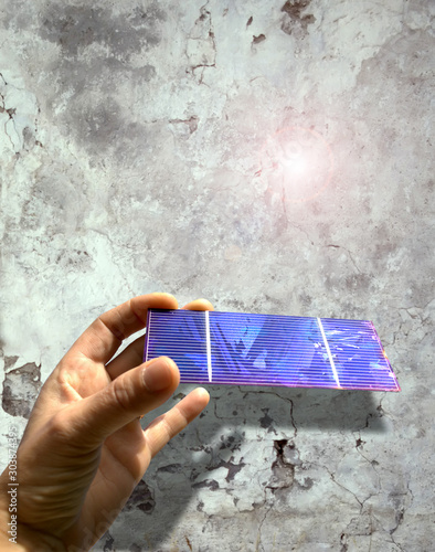 solar cell against an old wall