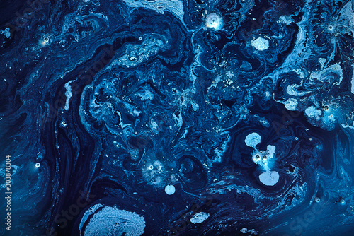 Abstract liquid blue colors outer space background. Exoplanet cosmic sea pattern, paint stains photo