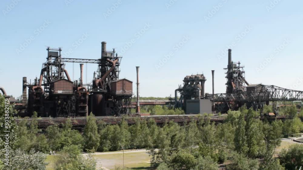 Defunct blast furnace for steel production of the Landschaftspark Duisburg-Nord and surrounding buildings. Defunct blast furnace for steel production of the Landschaftspark Duisburg-Nord and surrounding buildings.