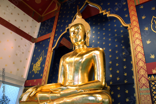 The golden meditating Buddha statue