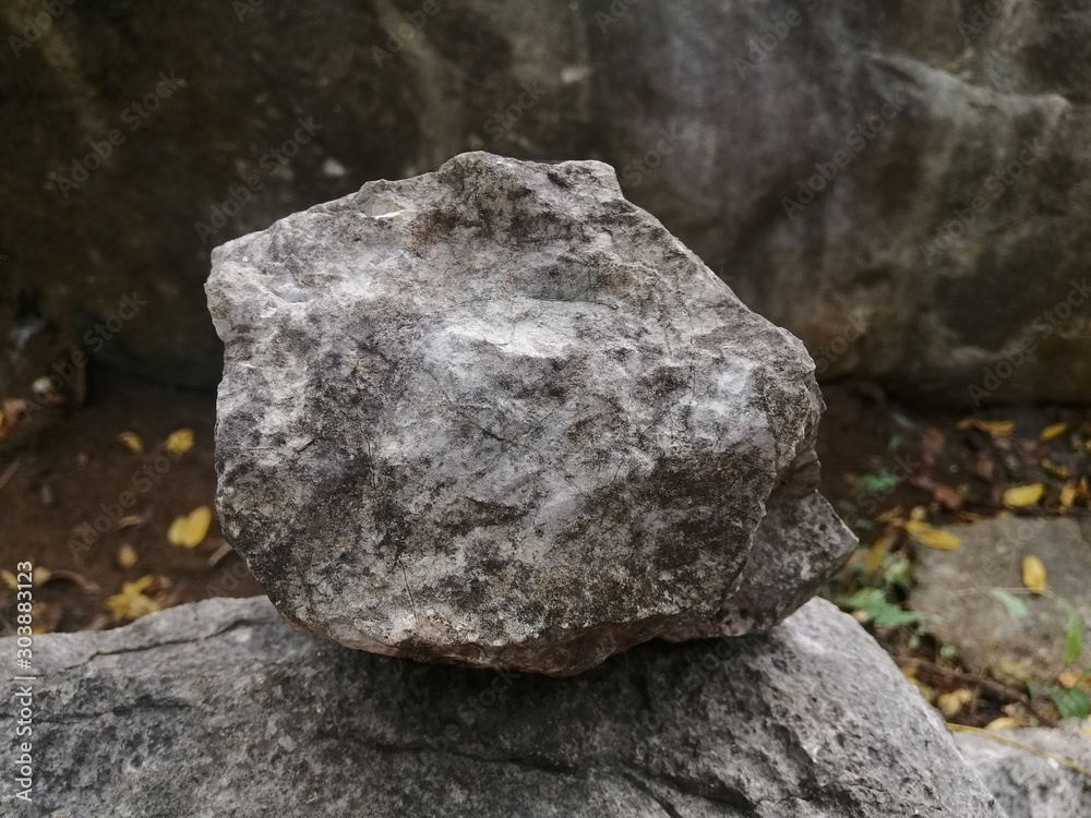 Stone formed from limestone and shale. There is noise and grain caused by the texture of the stone. Stone formed from limestone and shale. There is noise and grain caused by the texture of the stone.