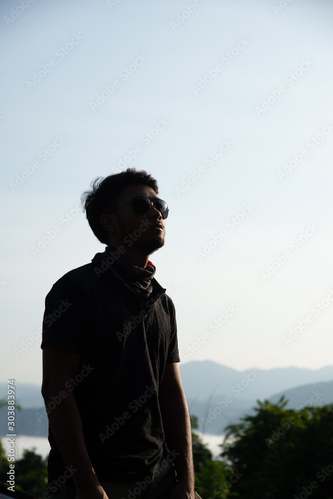 determined man, explorer pathfinder forest, military man forest, man with tactical gear at the cliff with mountain view, cool guy forest. determined man, explorer pathfinder forest, military man forest, man with tactical gear at the cliff with mountain view, cool guy forest.