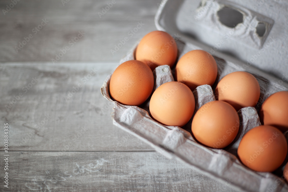 Whole brown eggs in carton Whole brown eggs in carton