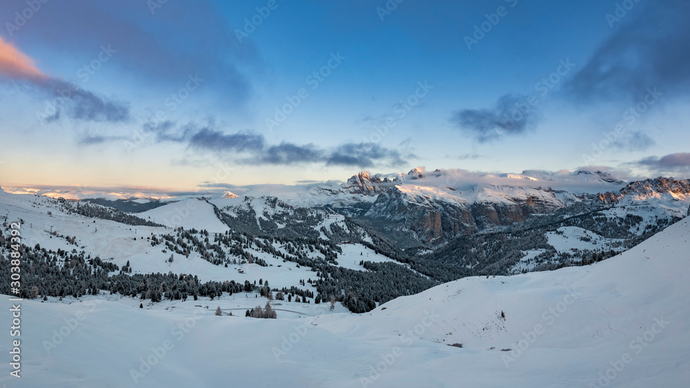 Sunrise over snow covered Alps in South Tyrol, Italy - Deep snow and blue sky