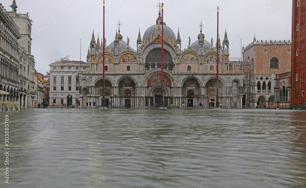 Incredible view of Basilica in Venice Italy with high water in S
