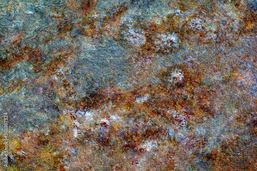 Rusty metal texture or background with streaks of rust. rusty metal wall, .old sheet of iron covered with rust and corrosion paint. .Oxidized iron panel.