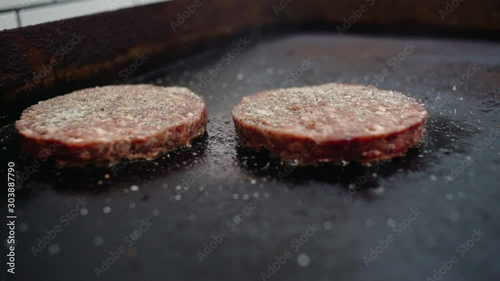 Fast Food Beef Burgers Fried on a Flat Stove Fast Food Beef Burgers Fried on a Flat Stove