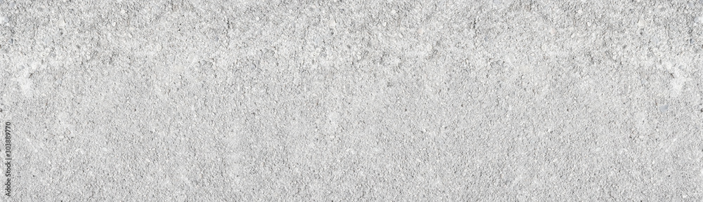 Fototapeta premium Light grey shabby concrete wall wide texture. Rough weathered cement surface long white backdrop. Large whitewashed background