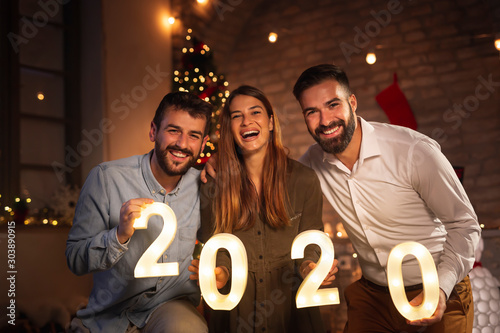 Canvas Print Friends having fun at New Years Eve party