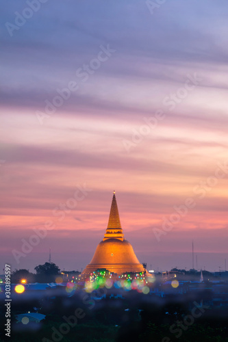 The big sacred pagoda of Bangkok suburb in Nakhon Pathom at sunrise
