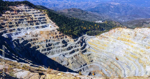large quarry mining of iron ore near Rosia Montana village, Romania photo