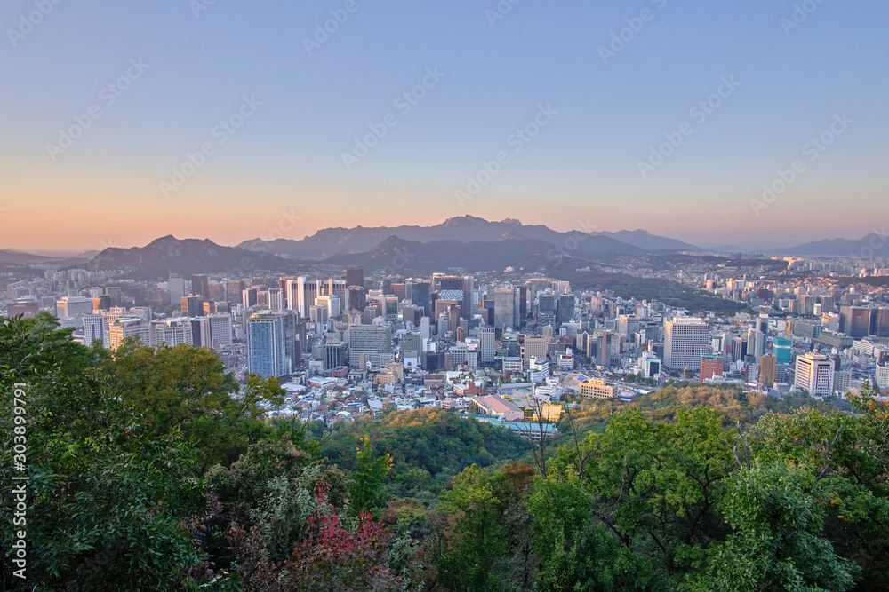 Scenic view of the capital of Republic of Korea. Beautiful summer look of the largest city of South Korea. Picture of town of traditional asian architecture