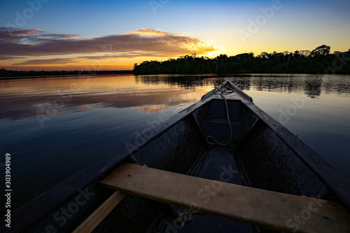 Boat on the Sandoval lake. Puerto Maldonado, Peru. photo