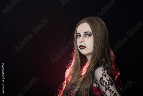 witch vampire girl in red dress