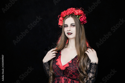 witch vampire girl in red dress with red veil