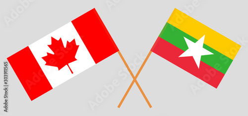 Crossed flags of Myanmar and Canada