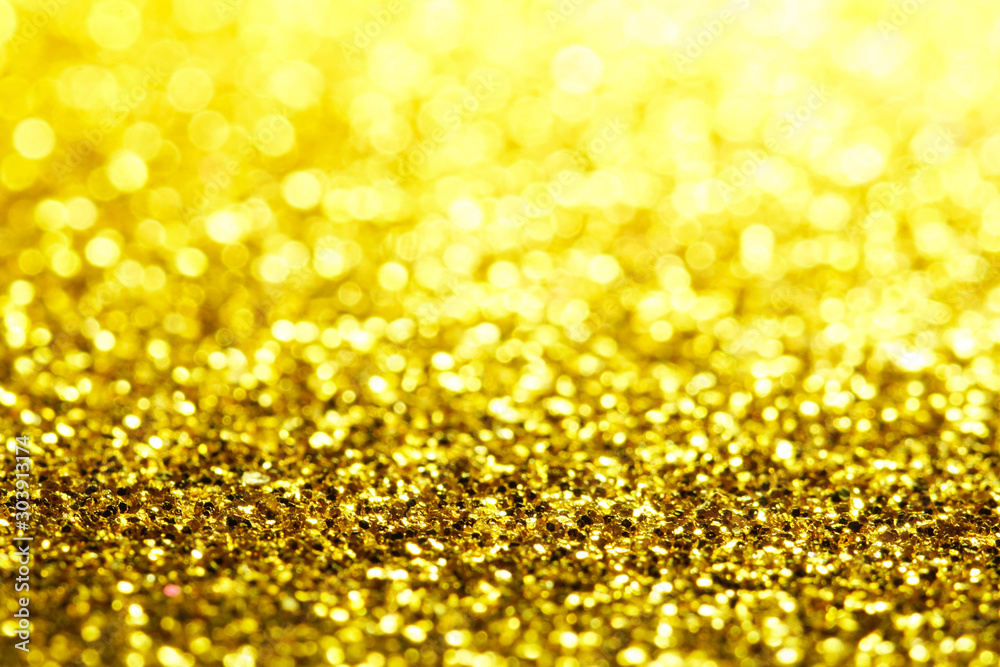 gold Sparkling Lights Festive background with texture. Abstract Christmas twinkled bright bokeh defocused and Falling stars. Winter Card or invitation gold Sparkling Lights Festive background with texture. Abstract Christmas twinkled bright bokeh defocused and Falling stars. Winter Card or invitation