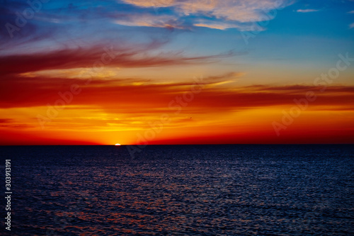 Sunset over the ocean © sarymsakov.com