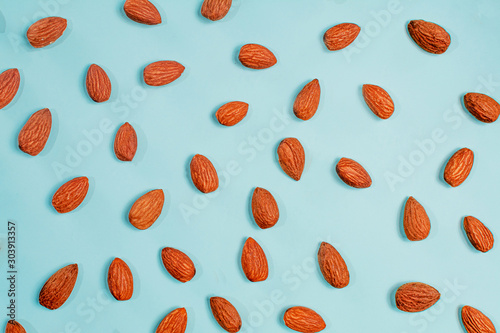 Blue background with almonds