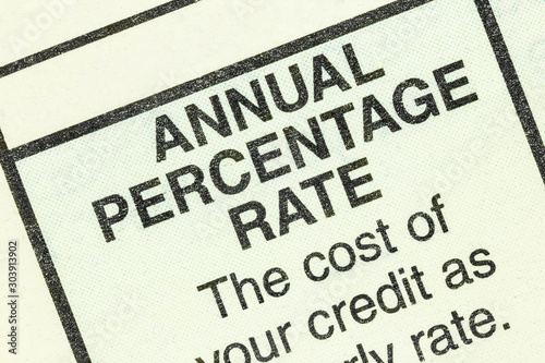 Close up macro view of annual percentage rate detail in the standard federal truth in lending section on an automobile purchase form.