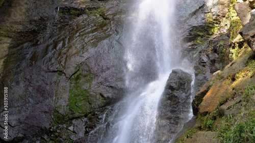 Makhuntseti Waterfall in Autumn. Falling Water Hitting on the Rocks. Slow Motion. photo