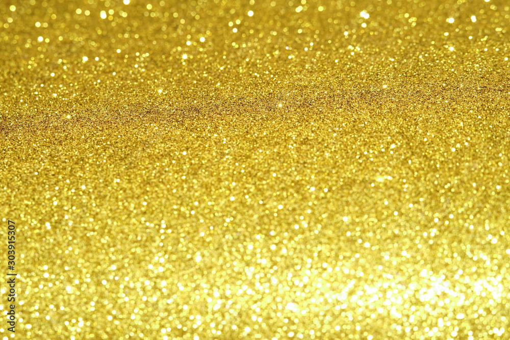 gold Sparkling Lights Festive background with texture. Abstract Christmas twinkled bright bokeh defocused and Falling stars. Winter Card or invitation gold Sparkling Lights Festive background with texture. Abstract Christmas twinkled bright bokeh defocused and Falling stars. Winter Card or invitation