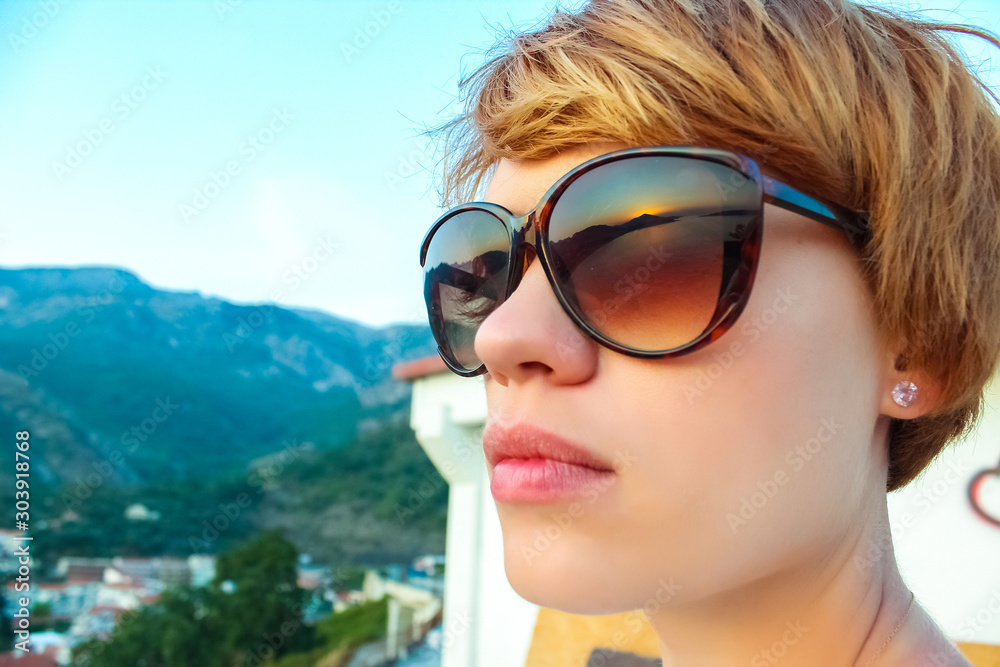 The portrait of beautiful woman outdoor. Summer. The portrait of beautiful woman outdoor. Summer.