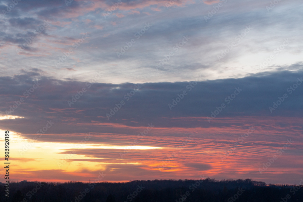 Sunset stratified clouds 