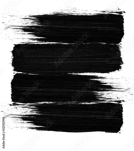 Sweeping black brush strokes isolated on white background. Print. Traces of the drawing with a black fleecy brush on a bright light backdrop.