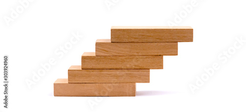 Wood block stacking as step stair  Business concept for growth success process.