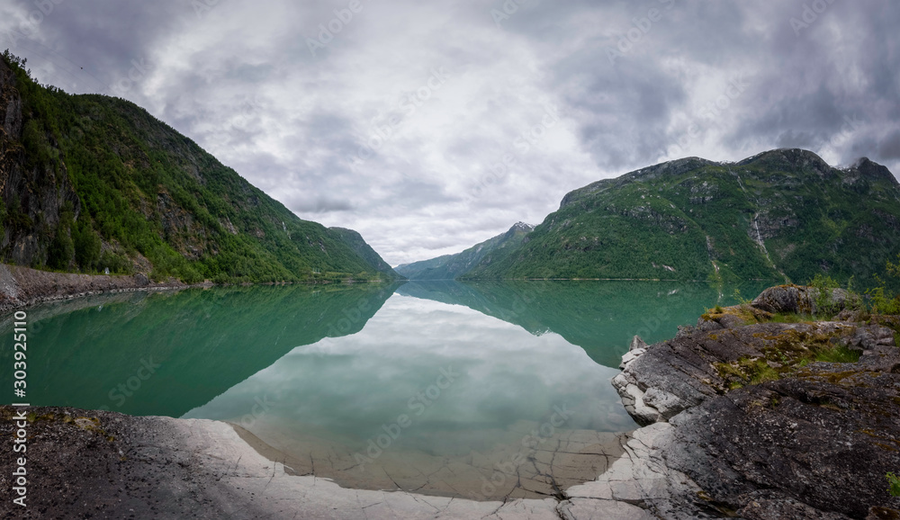 Wide panorama of glacial fed lake Norway Wide panorama of glacial fed lake Norway