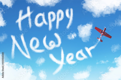 New Year 2020, a turboprop light engine aircraft draws numbers in the sky among clouds. photo