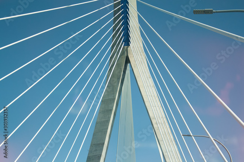 Fototapeta Naklejka Na Ścianę i Meble -  Close-up of cable-stayed bridge, view from below.