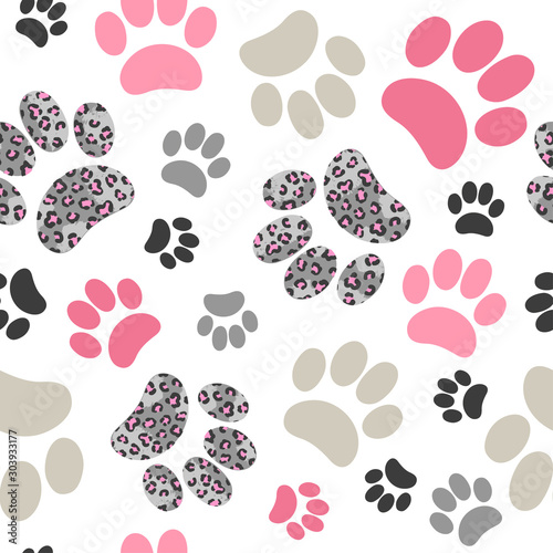 Seamless cats paws pattern with leopard print for kids design.
