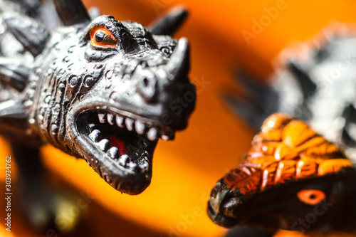 heads of rubber toy dinosaurs photo