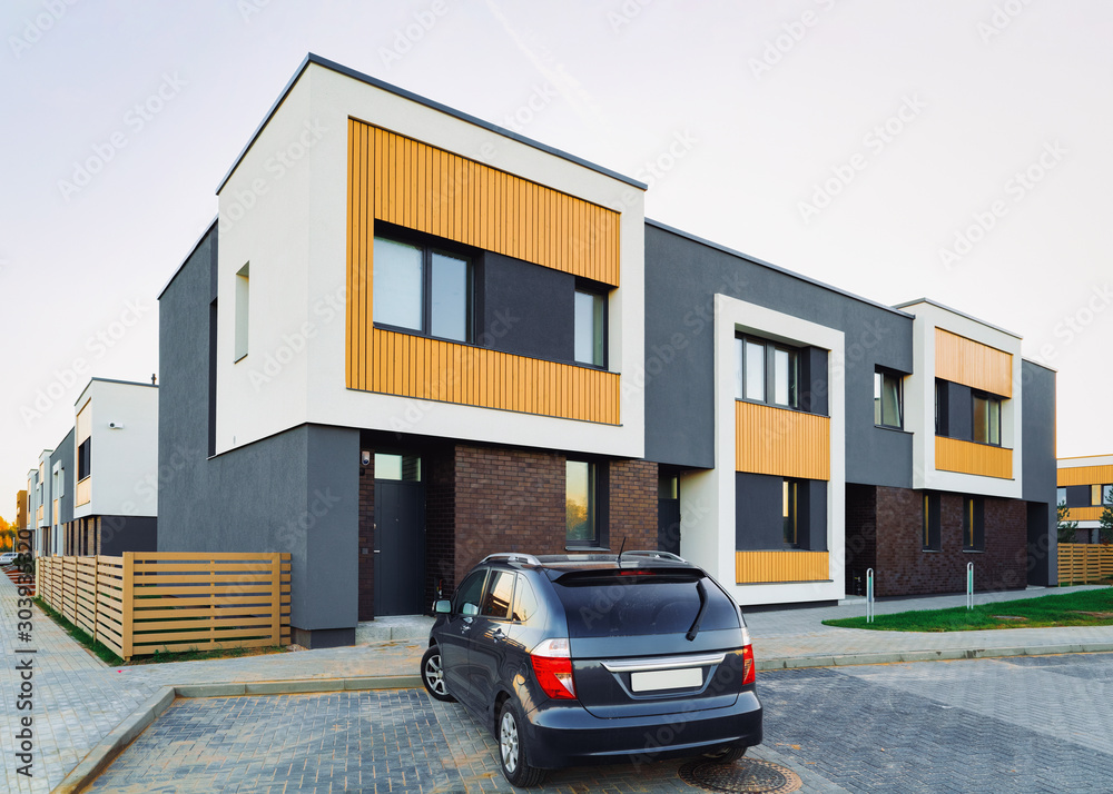 Φωτογραφία Apartment modern town house residential building and car parked in the street