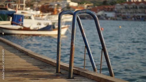 A rusty laddder near the beach